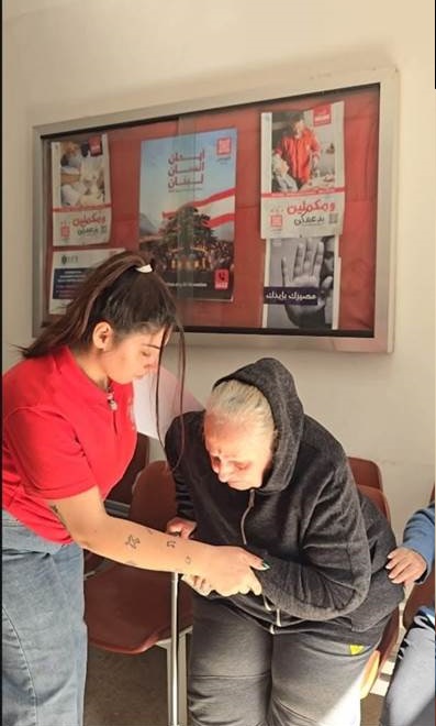 Description: A person looking at a tattoo on a person's arm  AI-generated content may be incorrect.